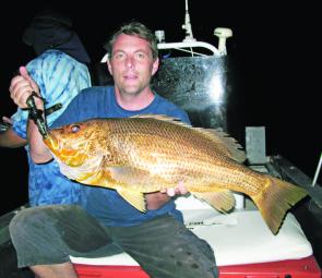 Steve Pearman with a trophy red off Townsville. 